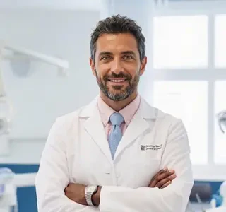 Dr. Brendan John